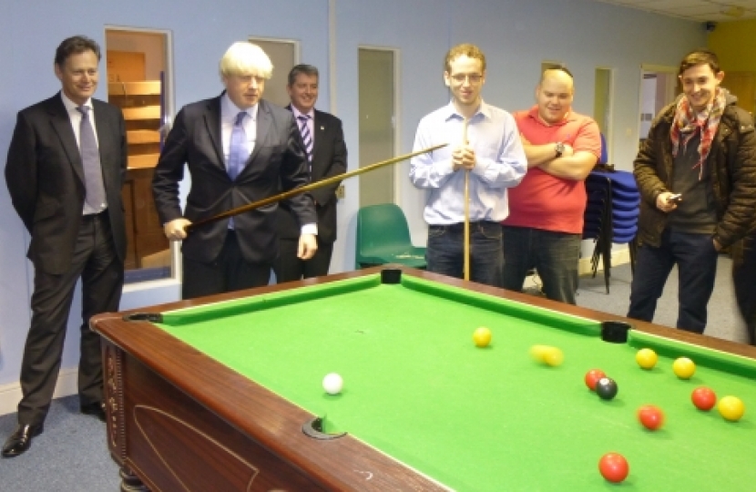 London Mayor Boris Johnson playing pool at 'The Boys Clubhouse' in Hendon